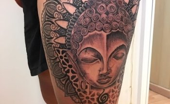 Huracán Tattoo Body Piercing